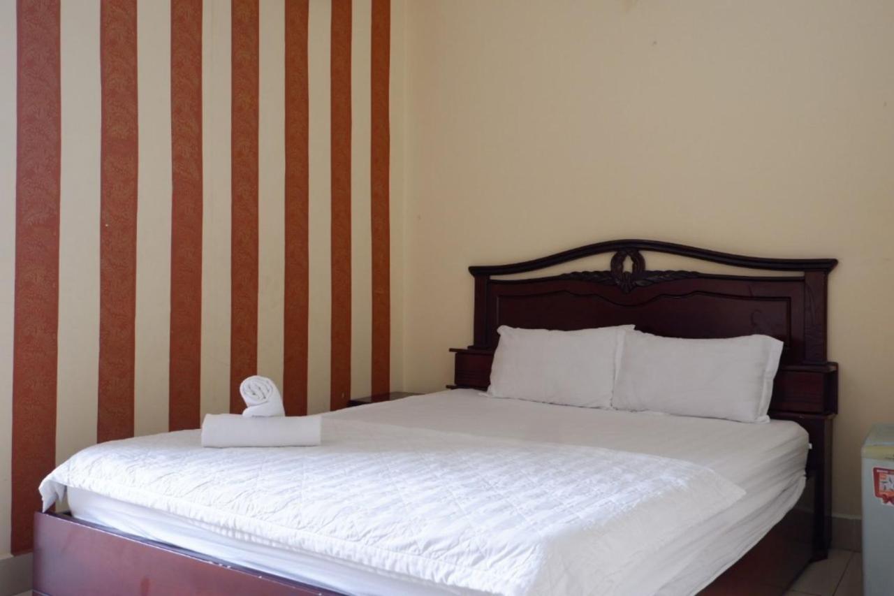 Reddoorz Tuan Viet Hotel Dinh Tien Hoang Хошимин Екстериор снимка