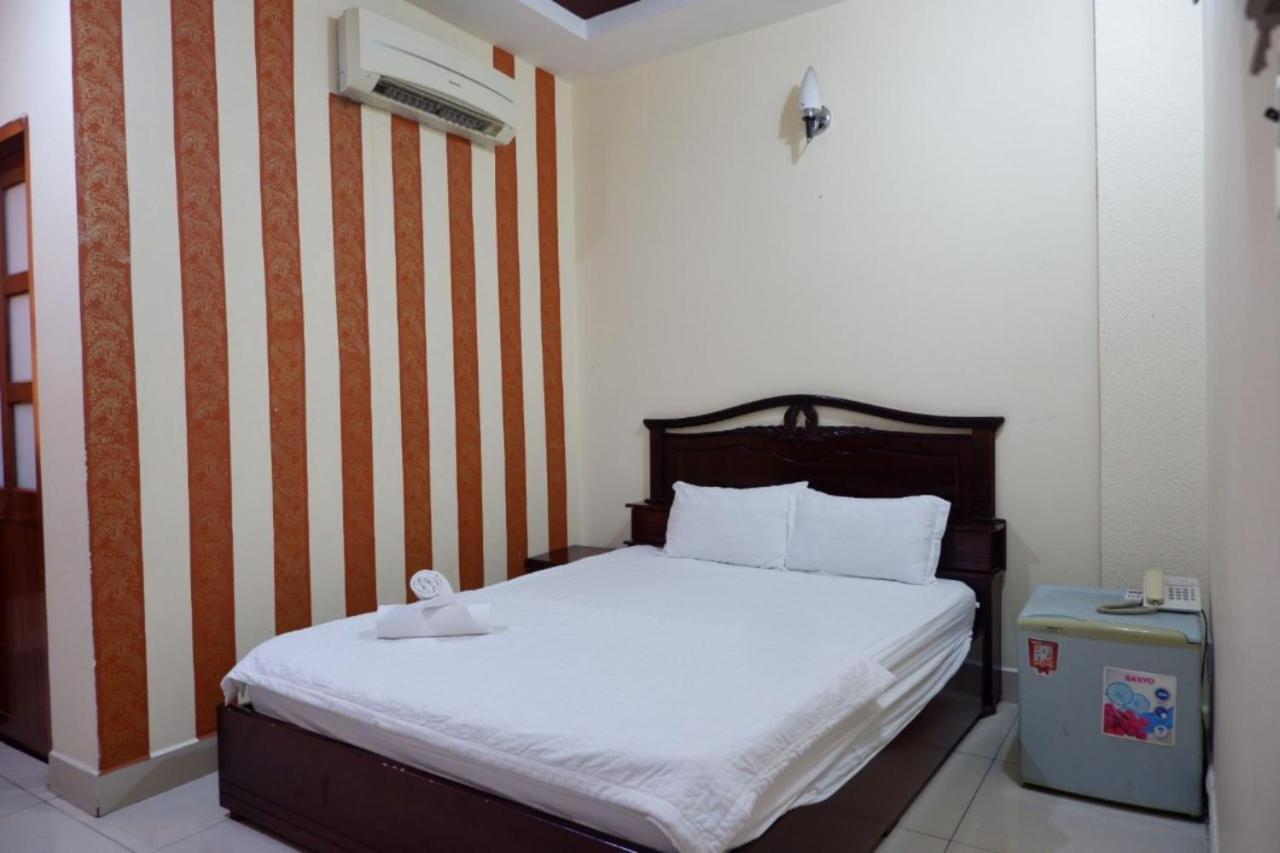 Reddoorz Tuan Viet Hotel Dinh Tien Hoang Хошимин Екстериор снимка